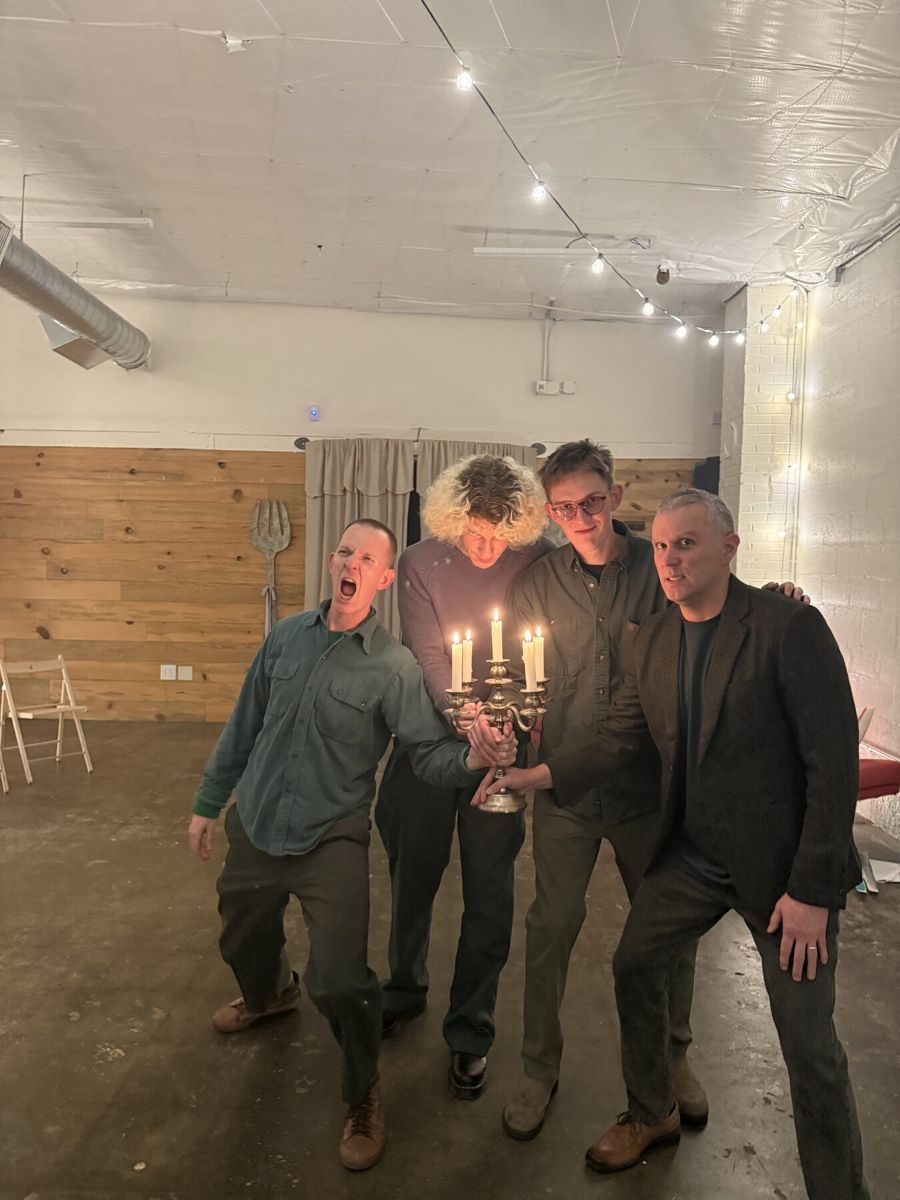 Friends gathered together at a past Winter Solstice party